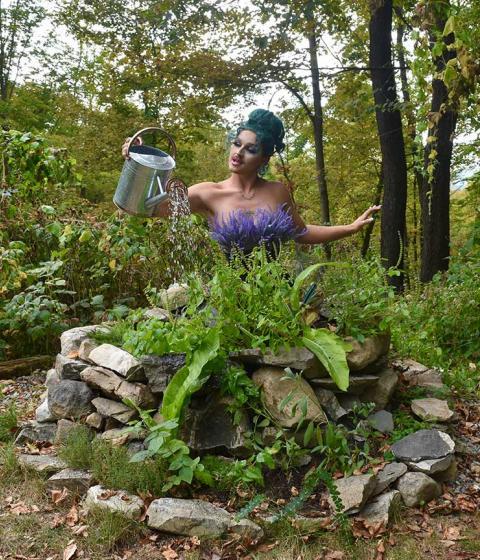 Forrest Fleur watering a garden