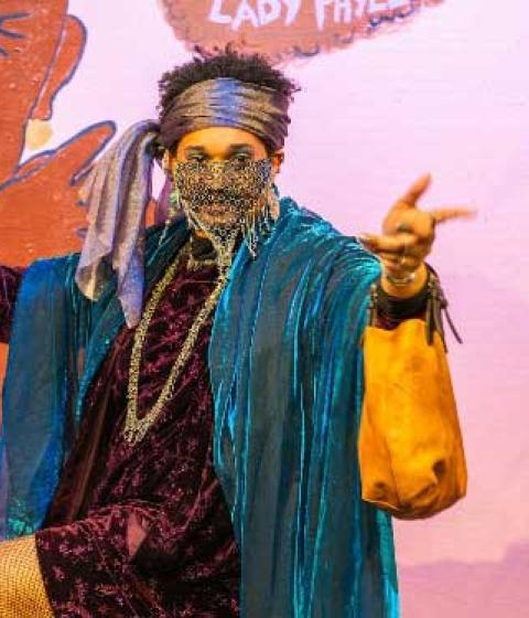 Karim Barrett 23F performing in their play, Heaven's Door