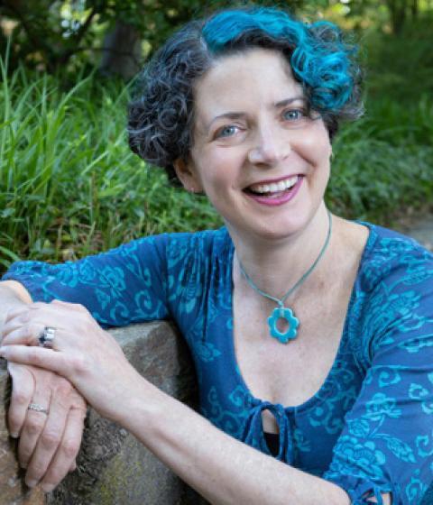 Erica Perl and the cover of the book, A Whale of a Tea Party
