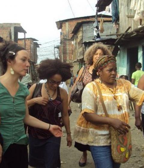 Professor Roosbelinda Cárdenas and friends in the field