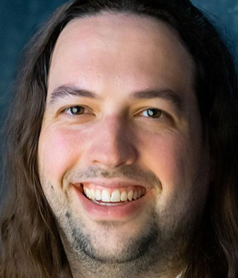 A headshot of Joe Fenstermaker