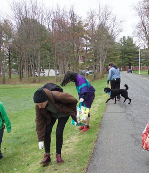 Students picking up litter on the Hampshire College campus