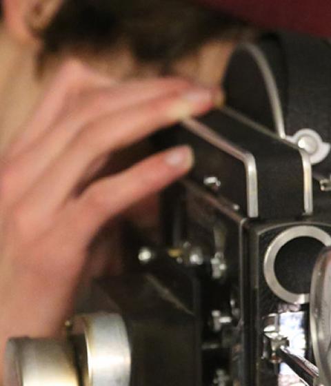 student with camera