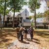 Students walking in the fall on campus.