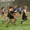 Students running in a 5k on Friends and Family Weekend.