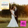 2024 Red Barn wedding awards with a photo of a couple at sunset.