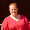 Mo Phelon woman with red shirt and red hair